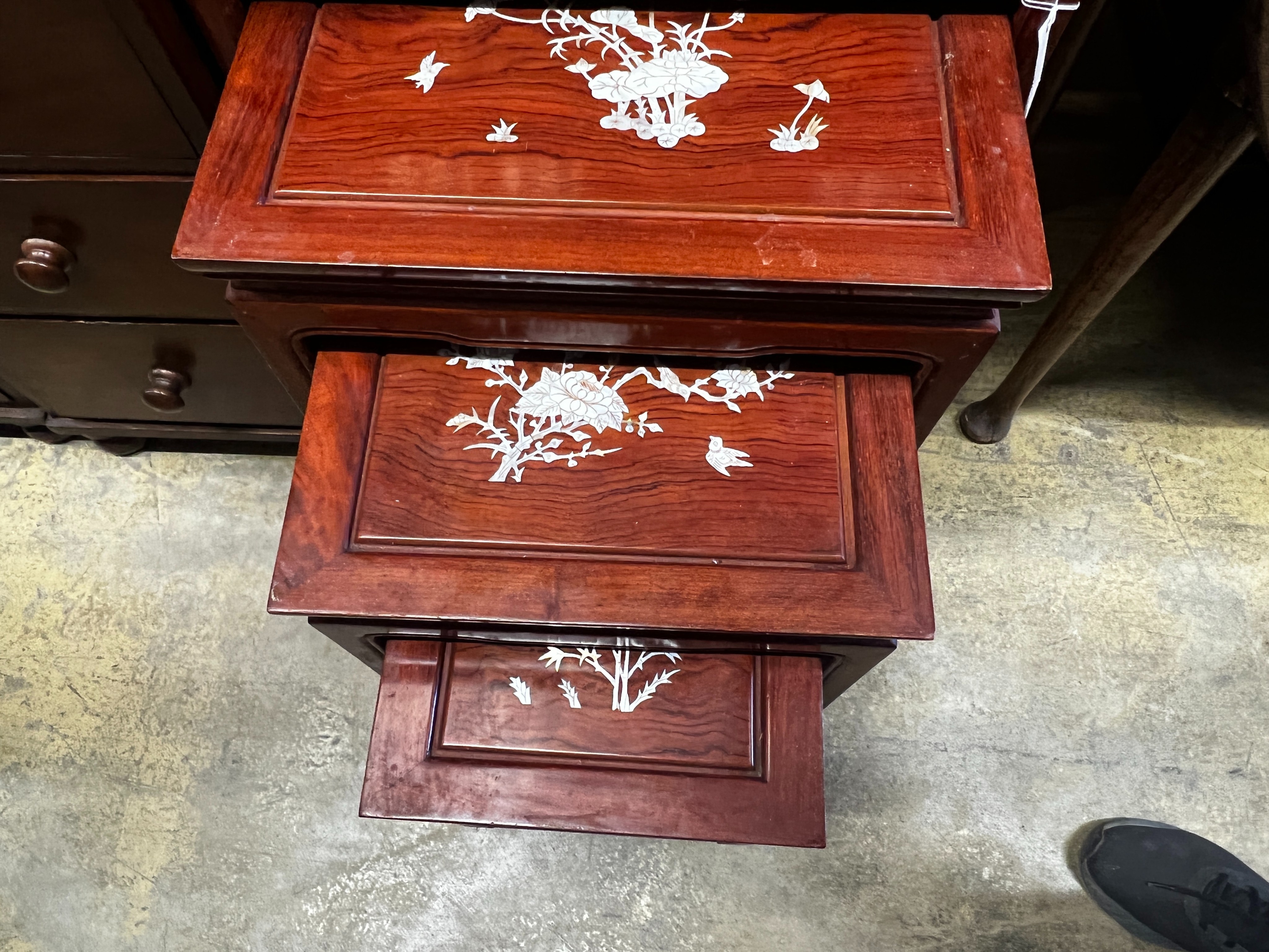 A quartetto of Chinese mother-of-pearl inlaid rectangular hardwood tea tables, width 50cm, depth 36cm, height 67cm